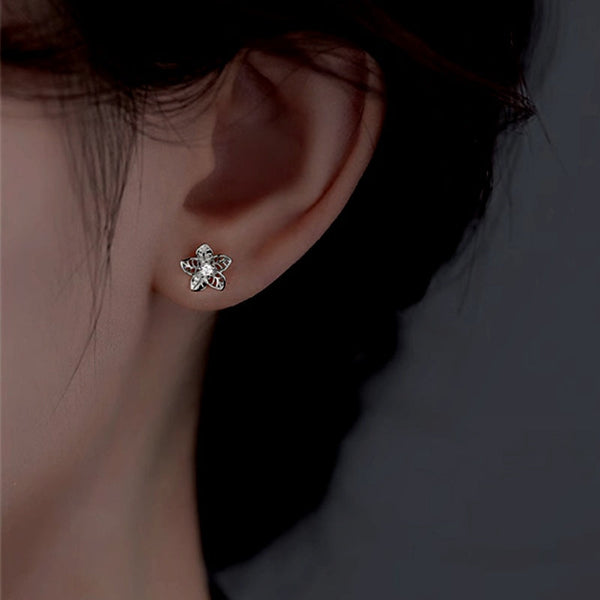 Sterling Silver Hollow Flower Stud Earrings